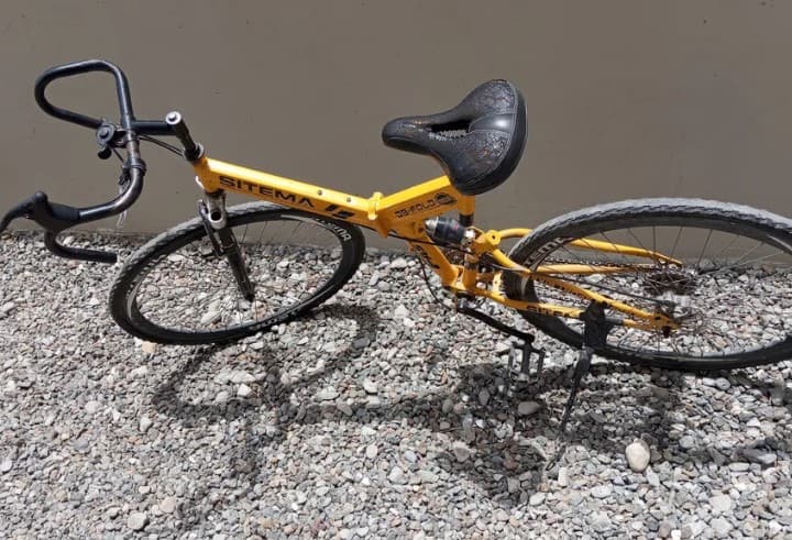 yellow bicycle photo 1