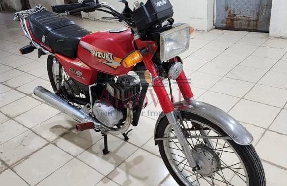Suzuki AX100 photo 1
